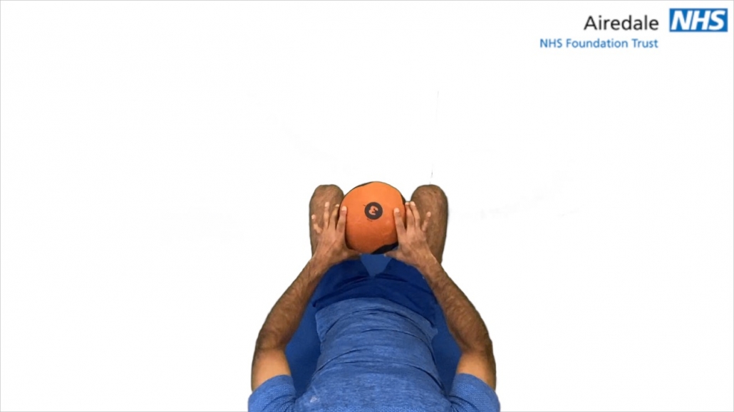 Isometric hip adduction with ball